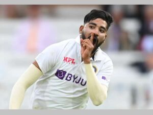 [Image of Mohammed Siraj celebrating his wicket]