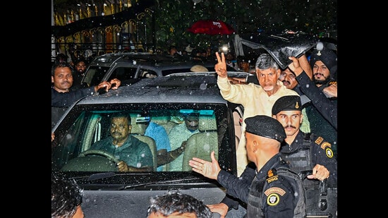 [Image of Chandrababu Naidu being taken into custody by the police]